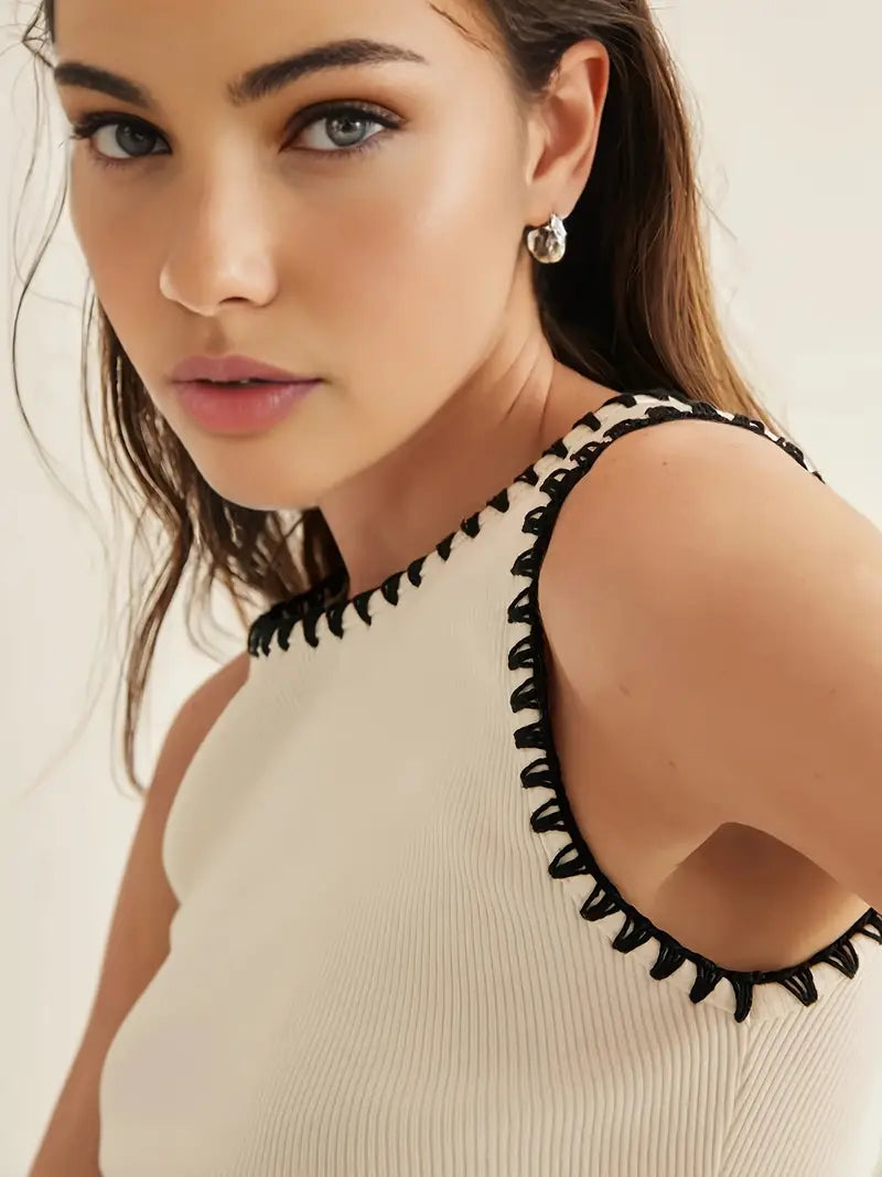 Sleeveless White Knit Top with Black Contrast Trim