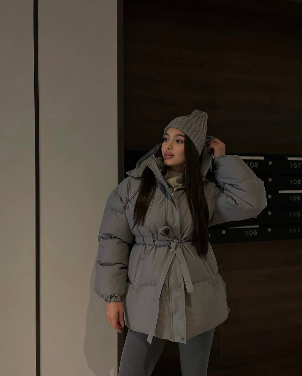 Moteriška pūkinė striukė su diržu