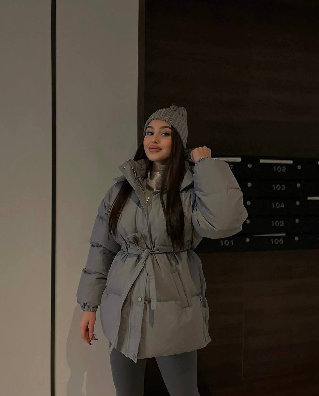 Moteriška pūkinė striukė su diržu